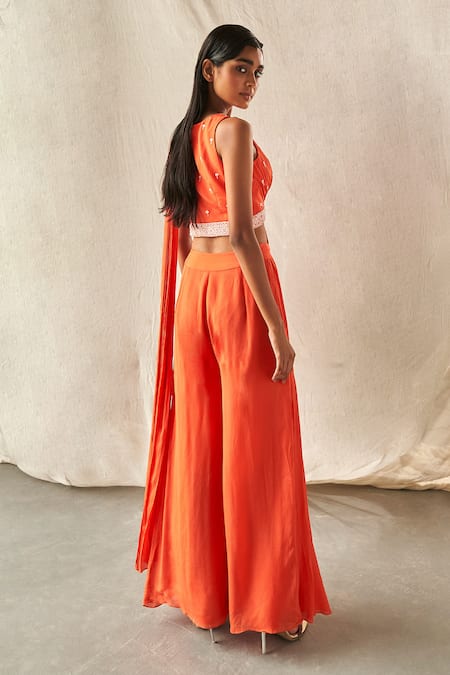 Shop_Kashmiraa_Orange Chiffon Sequins V-neck Embroidered Blouse And Pant Saree Set _at_Aza_Fashions