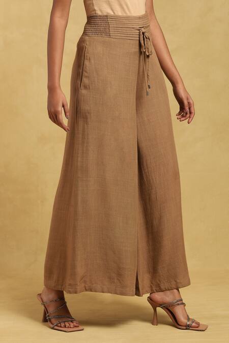 Buy Ritu Kumar Brown Cotton, Linen Pleated Waist Flared Palazzo Online at Aza Fashions Buy_Ritu Kumar_Brown Cotton, Linen Pleated Waist Flared Palazzo_Online_at_Aza_Fashions