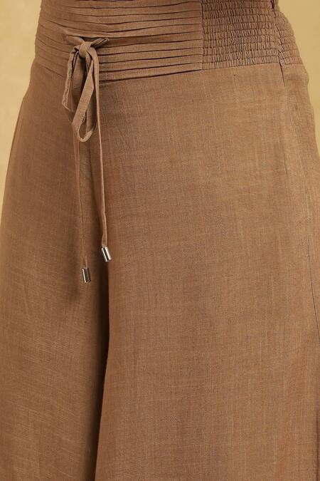 Ritu Kumar Brown Cotton, Linen Pleated Waist Flared Palazzo at Aza Fashions Ritu Kumar_Brown Cotton, Linen Pleated Waist Flared Palazzo_at_Aza_Fashions