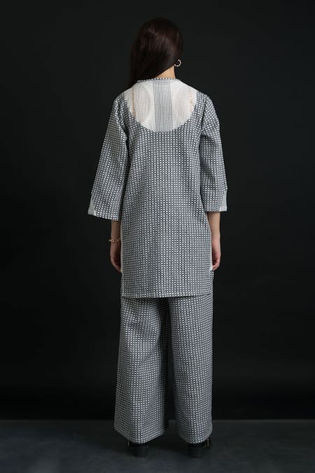 Shop Orcr White Cotton Beads Open Neck Loop Pattern Waffle Patch Jacket With Flared Pant at Aza Fashions Shop_Orcr_White Cotton Beads Open Neck Loop Pattern Waffle Patch Jacket With Flared Pant _at_Aza_Fashions