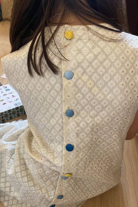 Shop Khela Ivory Cotton Silk Woven Geometric Textured Pintuck Dress at Aza Fashions Shop_Khela_Ivory Cotton Silk Woven Geometric Textured Pintuck Dress_at_Aza_Fashions