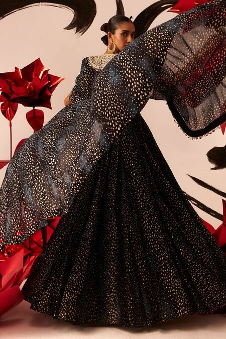 Shop Bhumika Sharma Black Georgette, Twill Sequins, Embroidery Rosette Print Cape Lehenga Set at Aza Fashions Shop_Bhumika Sharma_Black Georgette, Twill Sequins, Embroidery Rosette Print Cape Lehenga Set_at_Aza_Fashions