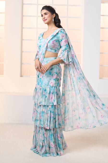 Shop Aariyana Couture Blue Viscose, Georgette Beads Lily Print Pre-draped Ruffle Saree With Blouse Online at Aza Fashions Shop_Aariyana Couture_Blue Viscose, Georgette Beads Lily Print Pre-draped Ruffle Saree With Blouse_Online_at_Aza_Fashions