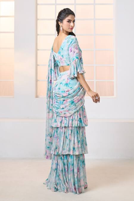 Shop Aariyana Couture Blue Viscose, Georgette Beads Lily Print Pre-draped Ruffle Saree With Blouse at Aza Fashions Shop_Aariyana Couture_Blue Viscose, Georgette Beads Lily Print Pre-draped Ruffle Saree With Blouse_at_Aza_Fashions