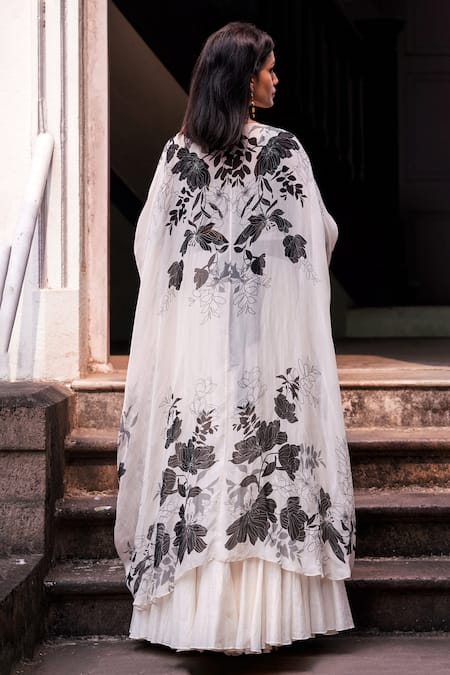 Shop Madder Much Ivory Perry Floral Pattern Embroidered Cape at Aza Fashions Shop_Madder Much_Ivory Perry Floral Pattern Embroidered Cape _at_Aza_Fashions