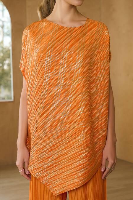 Shop Pleats By Aruni Orange Polyester Asymmetric Metallic Long Top With Pant Online at Aza Fashions Shop_Pleats By Aruni_Orange Polyester Asymmetric Metallic Long Top With Pant_Online_at_Aza_Fashions