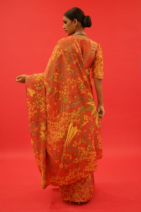 Shop Saksham & Neharicka Orange Tissue Surmayi Floral Hand Painted Saree With Unstitched Blouse Piece at Aza Fashions Shop_Saksham & Neharicka_Orange Tissue Surmayi Floral Hand Painted Saree With Unstitched Blouse Piece _at_Aza_Fashions