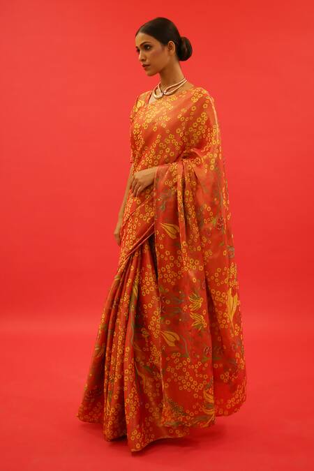 Saksham & Neharicka Orange Tissue Surmayi Floral Hand Painted Saree With Unstitched Blouse Piece Online at Aza Fashions Saksham & Neharicka_Orange Tissue Surmayi Floral Hand Painted Saree With Unstitched Blouse Piece _Online_at_Aza_Fashions