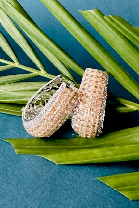 Shop Nayaab By Sonia Gold Plated Stones Oro Anneau Twisted Earrings Online at Aza Fashions Shop_Nayaab By Sonia_Gold Plated Stones Oro Anneau Twisted Earrings _Online_at_Aza_Fashions