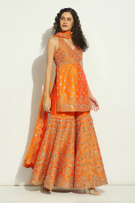 Shop Vandana Sethi Orange Silk, Chiffon Mirrors, Zari Halter Neck Work Kurta Gharara Set Online at Aza Fashions Shop_Vandana Sethi_Orange Silk, Chiffon Mirrors, Zari Halter Neck Work Kurta Gharara Set _Online_at_Aza_Fashions