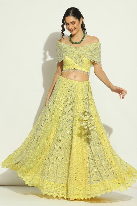 Shop Vandana Sethi Yellow Net Embroidery, Stones, Crystals V-neck Geometric Lehenga Blouse Set Online at Aza Fashions Shop_Vandana Sethi_Yellow Net Embroidery, Stones, Crystals V-neck Geometric Lehenga Blouse Set _Online_at_Aza_Fashions
