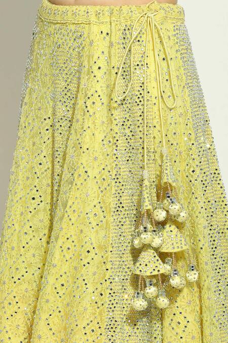 Vandana Sethi Yellow Net Embroidery, Stones, Crystals V-neck Geometric Lehenga Blouse Set at Aza Fashions Vandana Sethi_Yellow Net Embroidery, Stones, Crystals V-neck Geometric Lehenga Blouse Set _at_Aza_Fashions