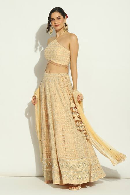 Shop_Vandana Sethi_Peach Net Embroidery, Stones Halter Neck Floral Lehenga Set _Online_at_Aza_Fashions
