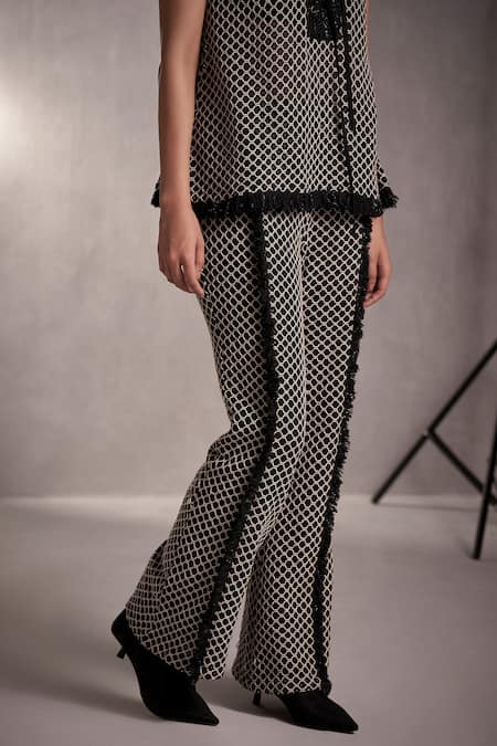 Qala Clothing Black Cotton, Tweed Fringe Mandarin Collar Knitted Crochet Top And Pant Set at Aza Fashions Qala Clothing_Black Cotton, Tweed Fringe Mandarin Collar Knitted Crochet Top And Pant Set _at_Aza_Fashions
