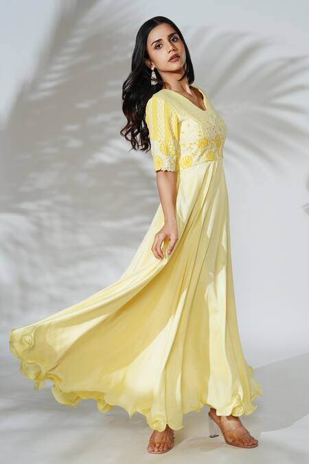 Anu Pellakuru_Yellow Linen, Silk Pearls, Sequins V-neck Resham Hand Embroidered Flared Gown_Online_at_Aza_Fashions