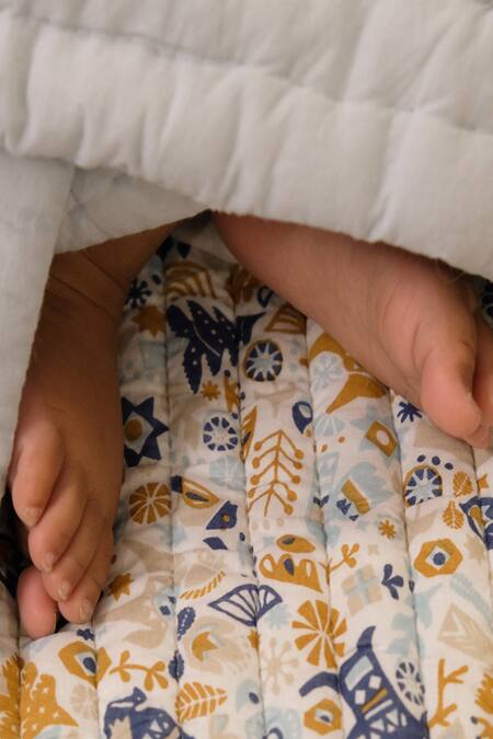 Design Gaatha_Off White 100% Cotton Print Christmas Element Baby Quilt_Online_at_Aza_Fashions
