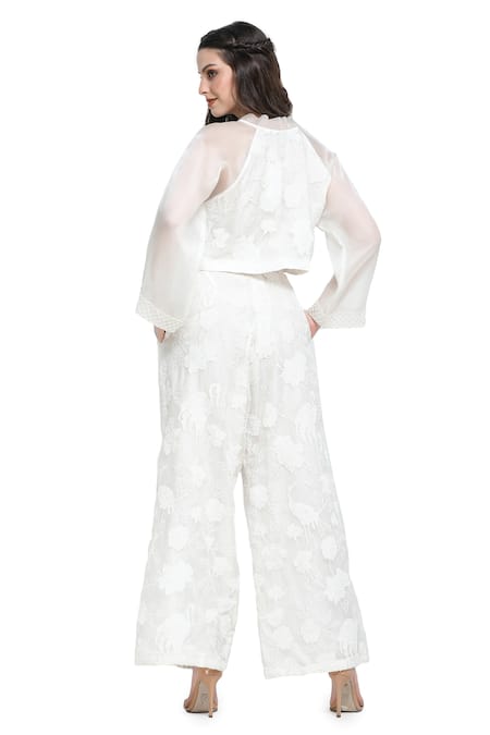 Shop Shruti Sancheti White Organza Pearls, Applique Camellia Floral Tie-up Top With Flared Pant at Aza Fashions Shop_Shruti Sancheti_White Organza Pearls, Applique Camellia Floral Tie-up Top With Flared Pant _at_Aza_Fashions