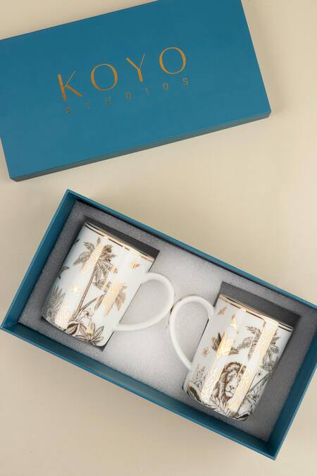 Shop Koyo Studios Gold Pure Porcelain Jungle Safari South African Pattern Mugs - 2 Pcs at Aza Fashions Shop_Koyo Studios_Gold Pure Porcelain Jungle Safari South African Pattern Mugs - 2 Pcs_at_Aza_Fashions