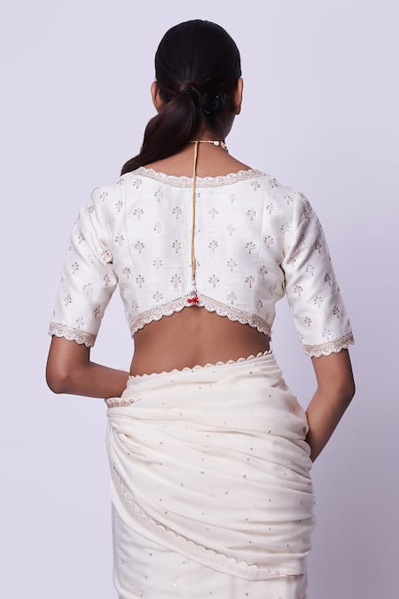 Shop Kavitha Gutta Cream Saree 100% Silk Crepe Hand Embroidered Sequins V Neck With Blouse at Aza Fashions Shop_Kavitha Gutta_Cream Saree 100% Silk Crepe Hand Embroidered Sequins V Neck With Blouse _at_Aza_Fashions