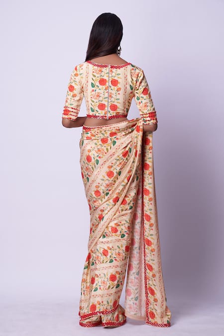 Shop Kavitha Gutta Cream Crepe, Linen Embroidery, Mirrors V-neck Floral Pattern Saree With Blouse at Aza Fashions Shop_Kavitha Gutta_Cream Crepe, Linen Embroidery, Mirrors V-neck Floral Pattern Saree With Blouse _at_Aza_Fashions