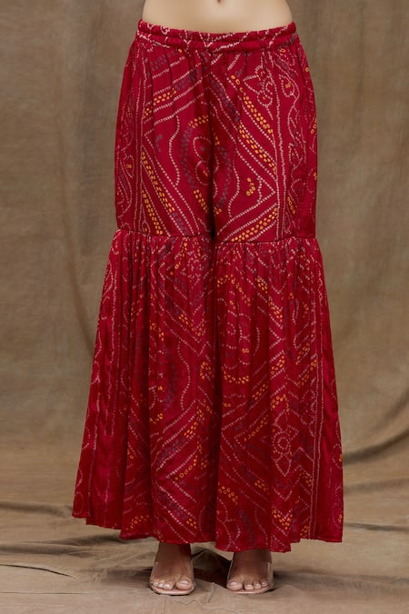 Naintara Bajaj Red Silk Lace, Sequins Round Neck Bandhani Print Kurta Sharara Set at Aza Fashions Naintara Bajaj_Red Silk Lace, Sequins Round Neck Bandhani Print Kurta Sharara Set _at_Aza_Fashions