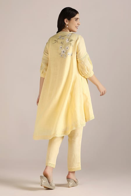 Shop Kaveri Yellow Linen Lace Round Neck Camellia Print Asymmetric Kurta With Pant at Aza Fashions Shop_Kaveri_Yellow Linen Lace Round Neck Camellia Print Asymmetric Kurta With Pant _at_Aza_Fashions