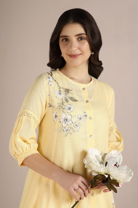 Kaveri Yellow Linen Lace Round Neck Camellia Print Asymmetric Kurta With Pant at Aza Fashions Kaveri_Yellow Linen Lace Round Neck Camellia Print Asymmetric Kurta With Pant _at_Aza_Fashions