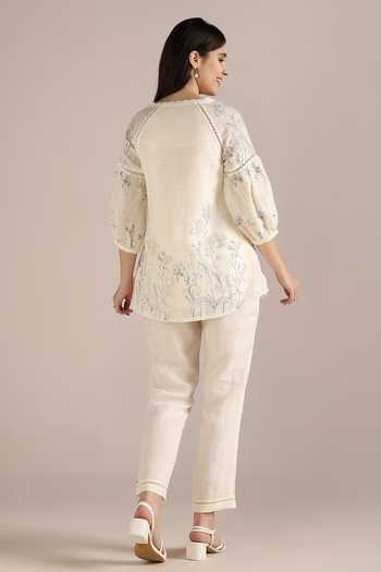 Shop Kaveri Off White Linen Embroidery Round Neck Savannah Kismat Top With Pant at Aza Fashions Shop_Kaveri_Off White Linen Embroidery Round Neck Savannah Kismat Top With Pant _at_Aza_Fashions