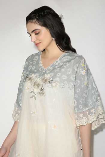 Kaveri_Off White Linen Tassels, Lace V-neck Croissant Embroidered Top And Pant Set _at_Aza_Fashions