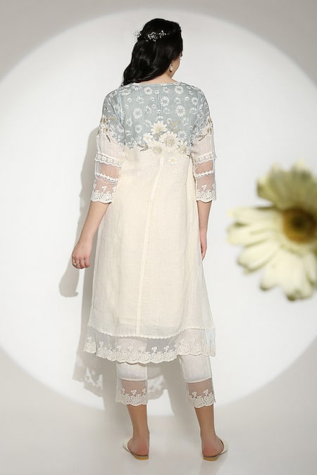 Shop Kaveri Off White 100% Linen Embroidered Thread Round Curved Fly Free Tunic at Aza Fashions Shop_Kaveri_Off White 100% Linen Embroidered Thread Round Curved Fly Free Tunic _at_Aza_Fashions