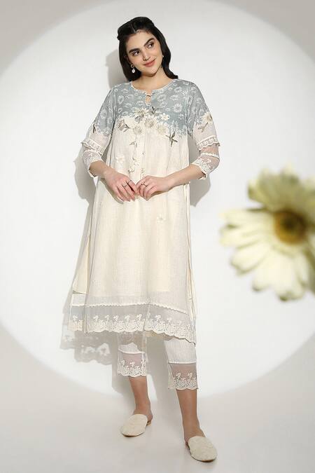 Kaveri Off White 100% Linen Embroidered Thread Round Curved Fly Free Tunic Online at Aza Fashions Kaveri_Off White 100% Linen Embroidered Thread Round Curved Fly Free Tunic _Online_at_Aza_Fashions