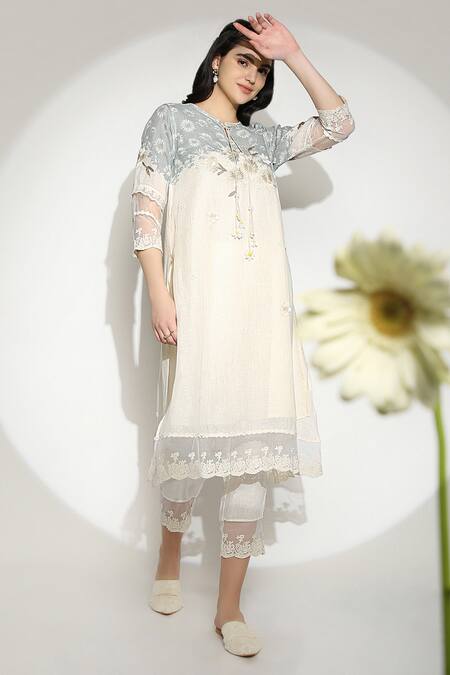 Buy Kaveri Off White 100% Linen Embroidered Thread Round Curved Fly Free Tunic Online at Aza Fashions Buy_Kaveri_Off White 100% Linen Embroidered Thread Round Curved Fly Free Tunic _Online_at_Aza_Fashions