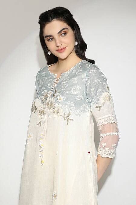 Shop Kaveri Off White 100% Linen Embroidered Thread Round Curved Fly Free Tunic Online at Aza Fashions Shop_Kaveri_Off White 100% Linen Embroidered Thread Round Curved Fly Free Tunic _Online_at_Aza_Fashions