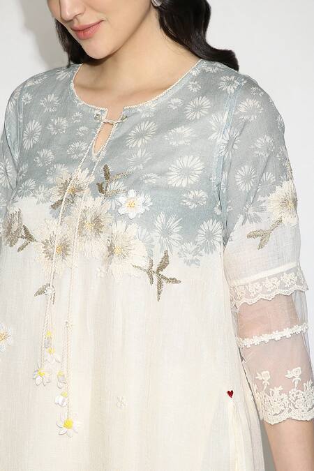 Kaveri Off White 100% Linen Embroidered Thread Round Curved Fly Free Tunic at Aza Fashions Kaveri_Off White 100% Linen Embroidered Thread Round Curved Fly Free Tunic _at_Aza_Fashions