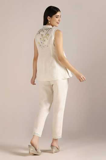 Shop Kaveri Off White Linen Lace V-neck Camelia Printed Sleeveless Top And Pant Set at Aza Fashions Shop_Kaveri_Off White Linen Lace V-neck Camelia Printed Sleeveless Top And Pant Set_at_Aza_Fashions