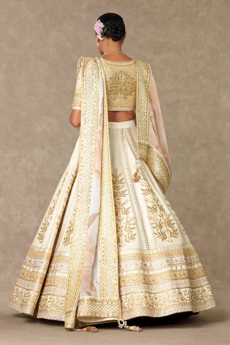 Shop Masaba Ivory Silk, Organza Diamonds, Raw Neel Kamal Embellished Bridal Lehenga Set at Aza Fashions Shop_Masaba_Ivory Silk, Organza Diamonds, Raw Neel Kamal Embellished Bridal Lehenga Set _at_Aza_Fashions