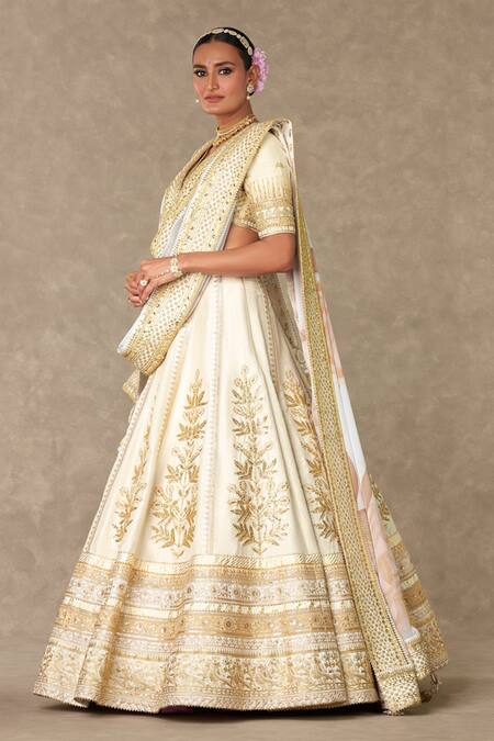 Buy Masaba Ivory Silk, Organza Diamonds, Raw Neel Kamal Embellished Bridal Lehenga Set Online at Aza Fashions Buy_Masaba_Ivory Silk, Organza Diamonds, Raw Neel Kamal Embellished Bridal Lehenga Set _Online_at_Aza_Fashions