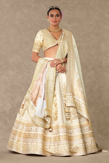 Buy Masaba Ivory Silk, Organza Embroidery, Tassels Raw Neel Kamal Bridal Lehenga Set Online at Aza Fashions Buy_Masaba_Ivory Silk, Organza Embroidery, Tassels Raw Neel Kamal Bridal Lehenga Set _Online_at_Aza_Fashions