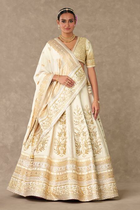 Shop Masaba Ivory Silk, Organza Embroidery, Tassels Raw Neel Kamal Bridal Lehenga Set Online at Aza Fashions Shop_Masaba_Ivory Silk, Organza Embroidery, Tassels Raw Neel Kamal Bridal Lehenga Set _Online_at_Aza_Fashions