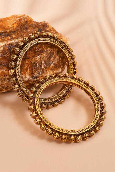 Shop_Anjali Jain_Gold Plated Beads Embellished Bangles - Set Of 2_at_Aza_Fashions