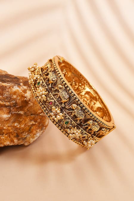 Shop_Anjali Jain_Gold Plated Pearl Elephant Carved Bangle _at_Aza_Fashions