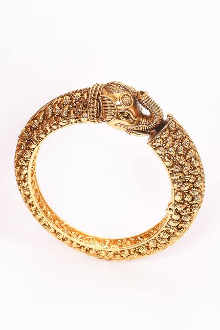 Anjali Jain_Gold Plated Cut Work Elephant Carved Bangles - Set Of 2_at_Aza_Fashions
