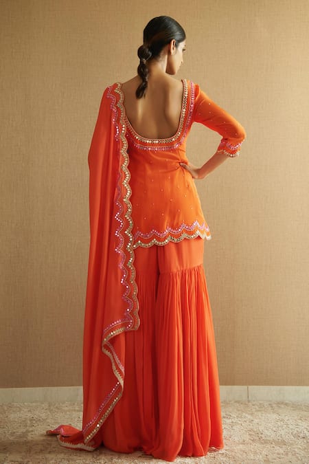 Shop Harshita Singhvi Orange Crepe, Chiffon Cut Work, Mirrors Round Hand Embroidered Kurta Sharara Set at Aza Fashions Shop_Harshita Singhvi_Orange Crepe, Chiffon Cut Work, Mirrors Round Hand Embroidered Kurta Sharara Set _at_Aza_Fashions