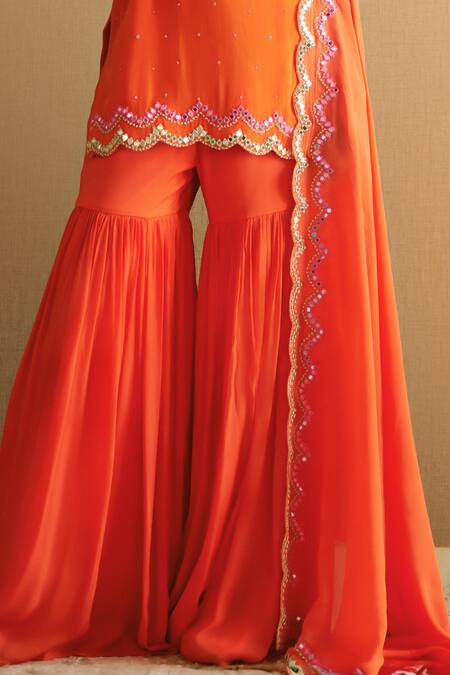 Buy Harshita Singhvi Orange Crepe, Chiffon Cut Work, Mirrors Round Hand Embroidered Kurta Sharara Set Online at Aza Fashions Buy_Harshita Singhvi_Orange Crepe, Chiffon Cut Work, Mirrors Round Hand Embroidered Kurta Sharara Set _Online_at_Aza_Fashions