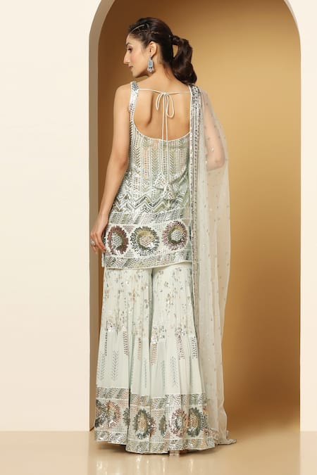 Shop Meenagurnam Blue Net, Georgette Sequins, Embroidery Floral Metallic Kurta Sharara Set at Aza Fashions Shop_Meenagurnam_Blue Net, Georgette Sequins, Embroidery Floral Metallic Kurta Sharara Set _at_Aza_Fashions