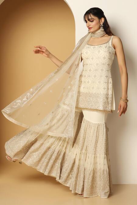 Meenagurnam Ivory Net, Georgette Beads, Geometric Blossom Embroidered Kurta Sharara Set Online at Aza Fashions Meenagurnam_Ivory Net, Georgette Beads, Geometric Blossom Embroidered Kurta Sharara Set _Online_at_Aza_Fashions