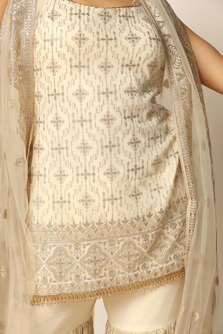 Buy Meenagurnam Ivory Net, Georgette Beads, Geometric Blossom Embroidered Kurta Sharara Set Online at Aza Fashions Buy_Meenagurnam_Ivory Net, Georgette Beads, Geometric Blossom Embroidered Kurta Sharara Set _Online_at_Aza_Fashions