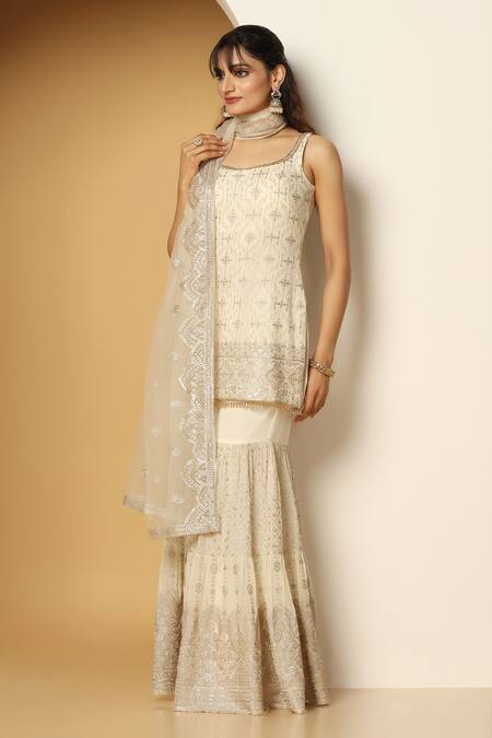 Shop Meenagurnam Ivory Net, Georgette Beads, Geometric Blossom Embroidered Kurta Sharara Set Online at Aza Fashions Shop_Meenagurnam_Ivory Net, Georgette Beads, Geometric Blossom Embroidered Kurta Sharara Set _Online_at_Aza_Fashions