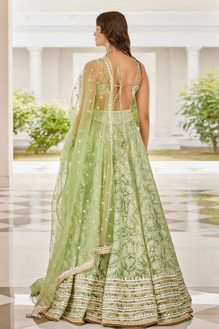 Shop Cedar & Pine Green Organza, Tulle Zari, Mirrors, Beads, Embroidery Autumn Leaves Lehenga Set at Aza Fashions Shop_Cedar & Pine_Green Organza, Tulle Zari, Mirrors, Beads, Embroidery Autumn Leaves Lehenga Set _at_Aza_Fashions
