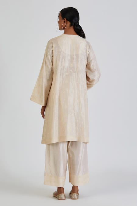 Shop Lajjoo C Ivory Silk Embroidery Anthemion Bloom Round Neck Hira Kurta With Palazzo at Aza Fashions Shop_Lajjoo C_Ivory Silk Embroidery Anthemion Bloom Round Neck Hira Kurta With Palazzo _at_Aza_Fashions